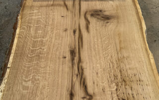 cutting a 30 foot white oak log at Hearne Hardwoods Inc.